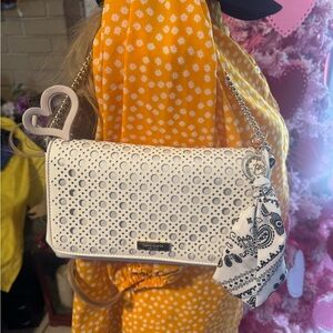 Kate Spade White Perforated Clutch with Heart Accent